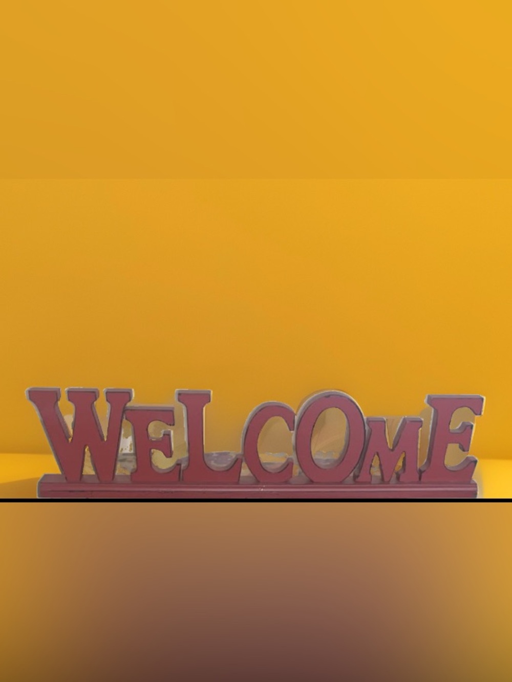 Red “Welcome” farm house accent decor sign